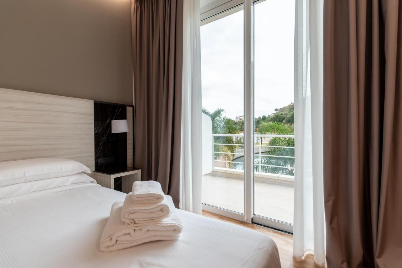 Sestante Marina Motel Capo dʼOrlando Екстериор снимка